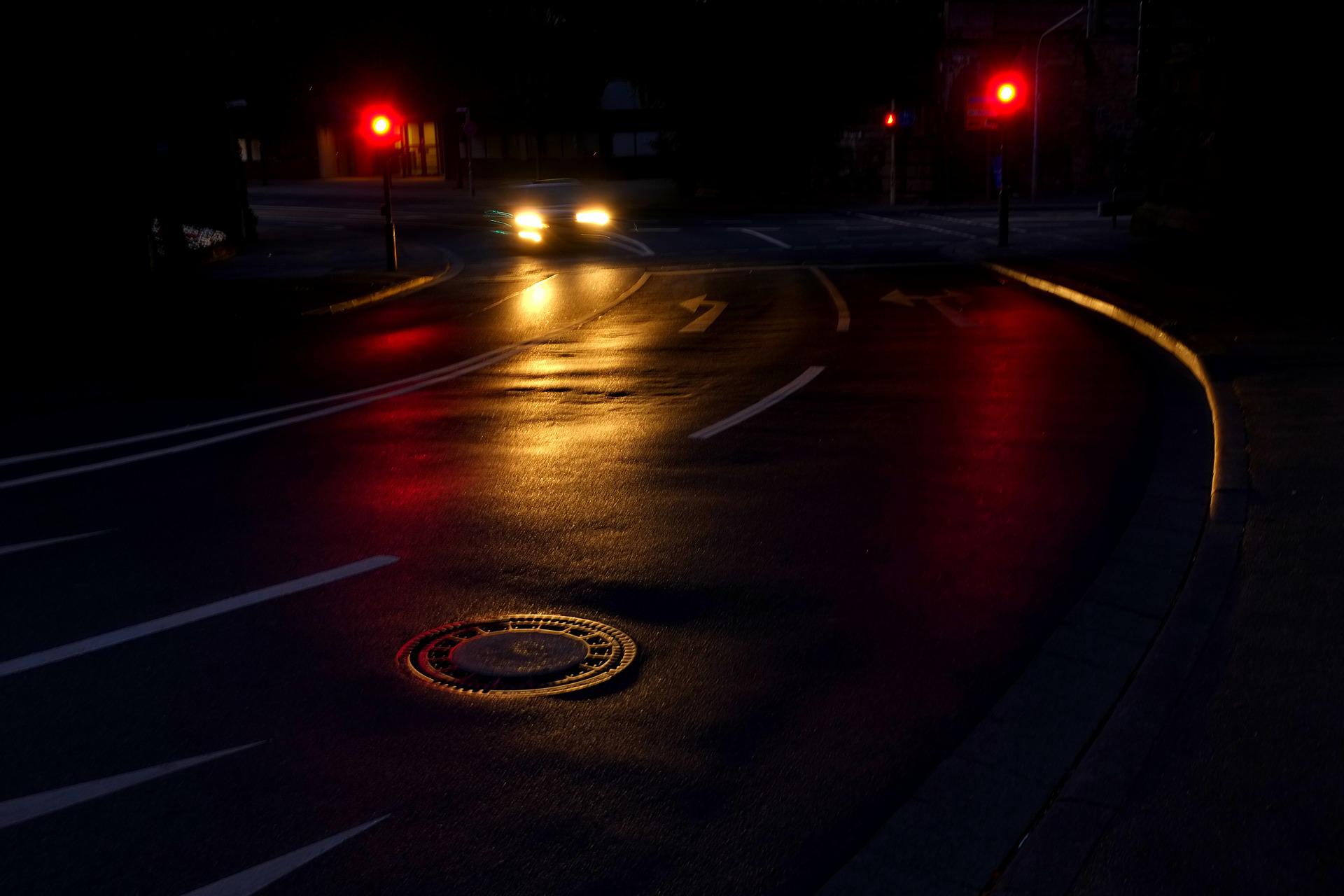 headlights on a dark road